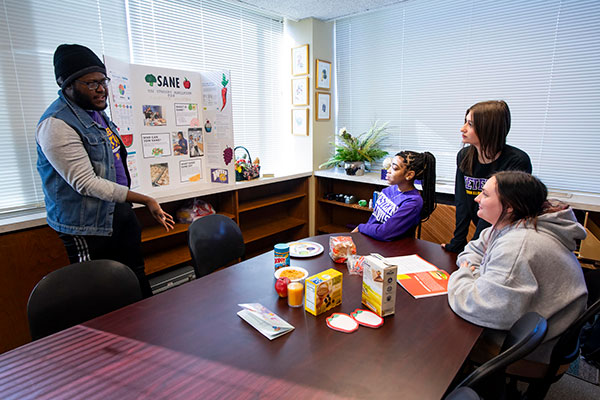 students discussing nutrition