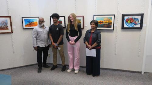 (From left to right):  Mr. Byron Oden-Shabazz, President of the McDonough Branch of the NAACP with the winners of the Story Map Competition, Harold Greene, Freshman MHS (2nd place), Nika Daytner, Junior MHS (winner), and Dr. Sunita George, Professor of Geography, and Education Secretary of the McDonough Branch of the NAACP at the award ceremony