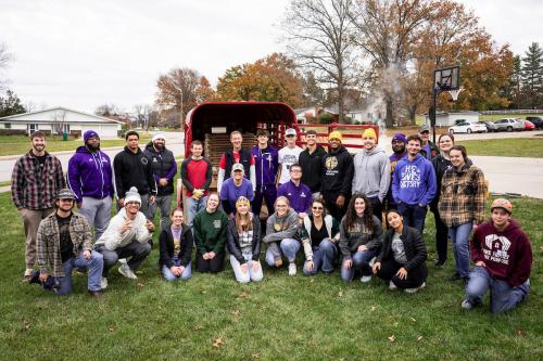 Members of the WIU football team took part in the ''Sleep in Heavenly Peace'' event, building 35 beds for children in need. 