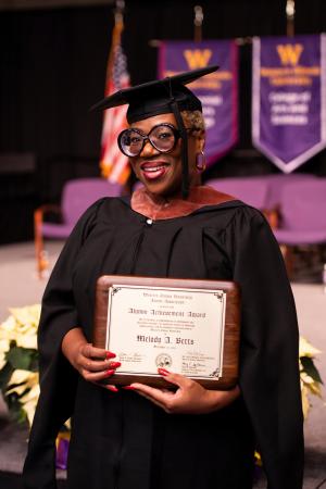 Melody Betts earned an Alumni Achievement Award at the Fall 2024 WIU commencement ceremony. 