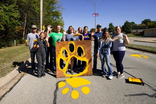 Part of the crew from the 2024 Paint the Paws event. This year's event will take place on Oct. 14.
