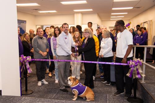 WIU President Kristi Mindrup and Assistant Vice President of Student Success Joe Roselieb cut the ribbon on the new Student Engagement Center.
